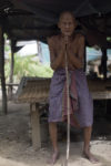 Nou Tab in his 'house' in Cambodia, elderly man with no income or health care